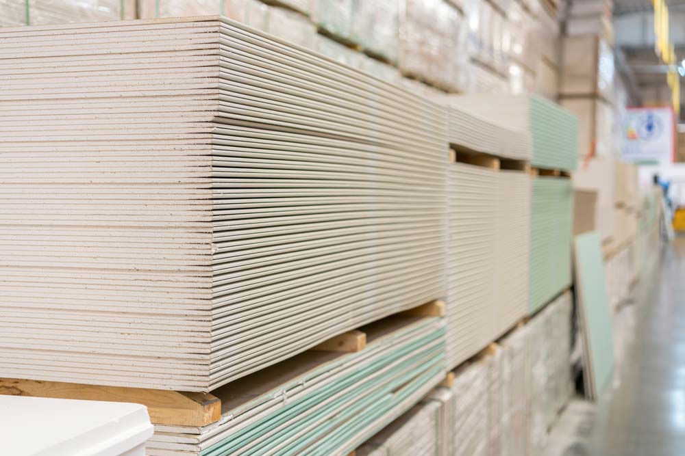 Pallets of plasterboard | Featured image for What is Plasterboard Used For Blog