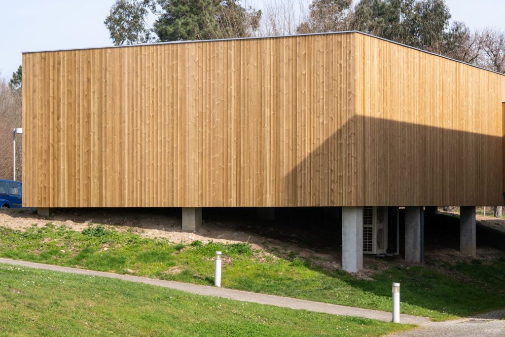 Modern Contemporary Wood Sided Building | Featured image for the Timber Cladding Alternatives blog from BetaBoard.