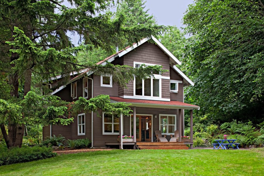 Contemporary farm house using brown and white as a colour scheme | Featured image for the Modern Farm House Design Ideas Blog from BetaBoard.