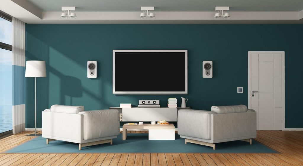 Modern home theatre space | Featured image for the Improving Room Acoustics with Sound Deadening Material blog from BetaBoard.