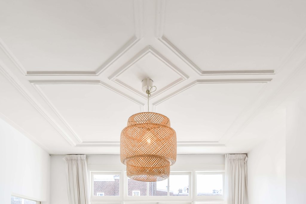 Modern ceiling panelling | Featured image for the How to Improve Air Quality with Ceiling Panelling blog by BetaBoard.