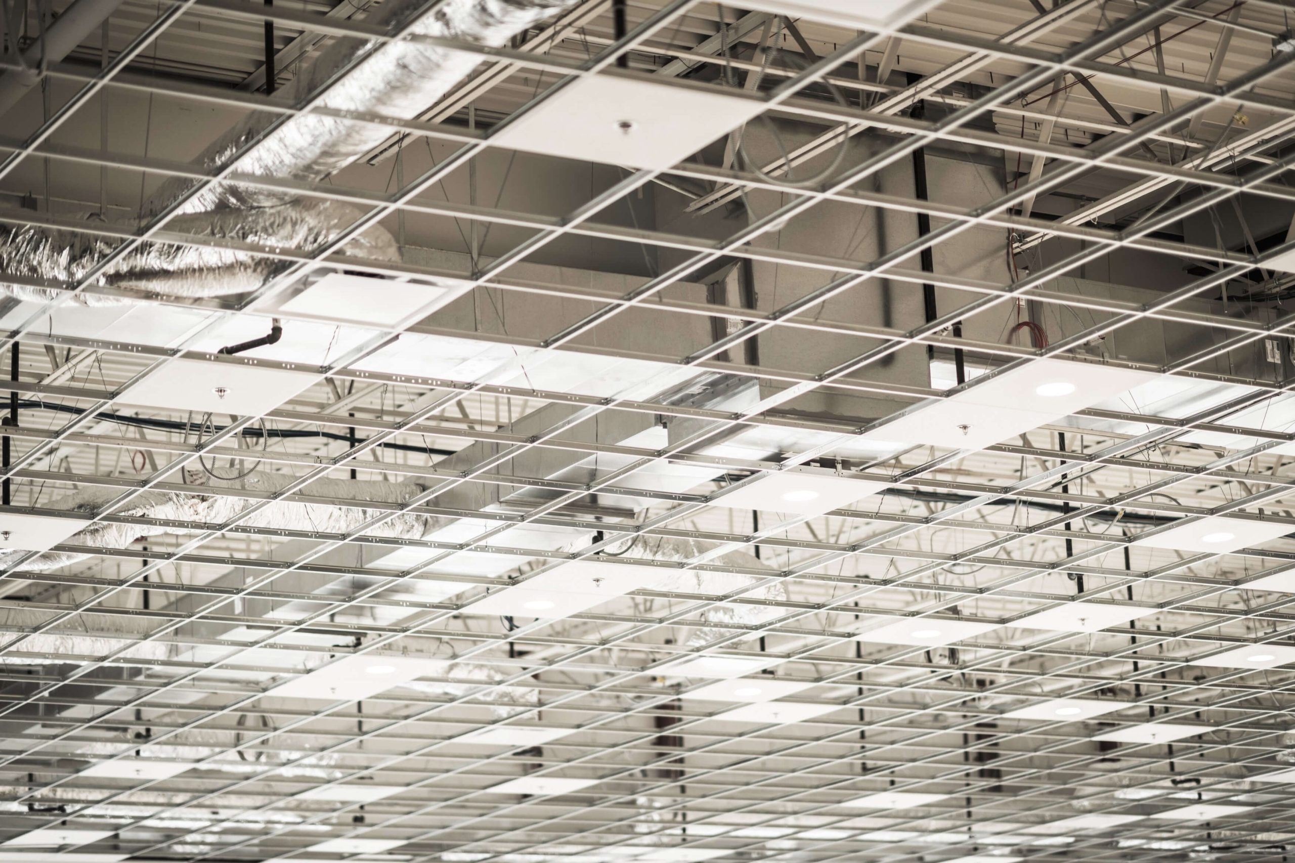 Suspended ceiling | Featured image for the The Benefits of Suspended Ceiling Systems blog from BetaBoard.